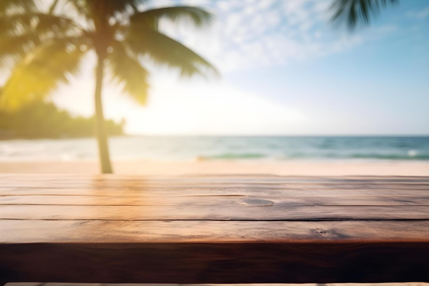Table in front of blurred tropical beach of summer time background. photo