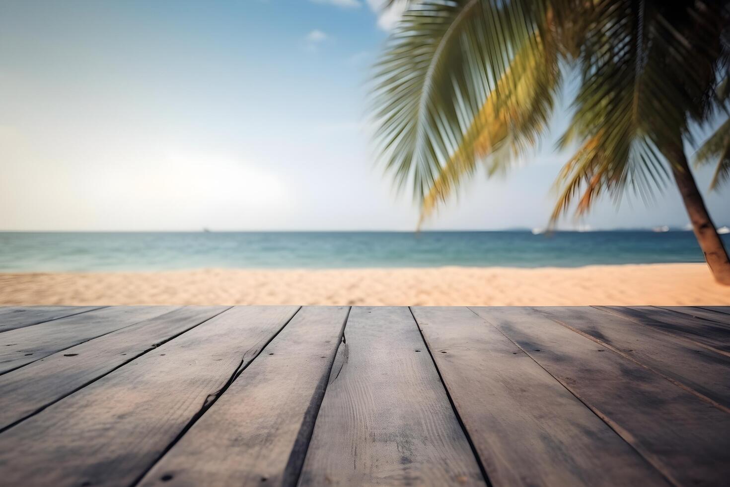 Table in front of blurred tropical beach of summer time background. photo