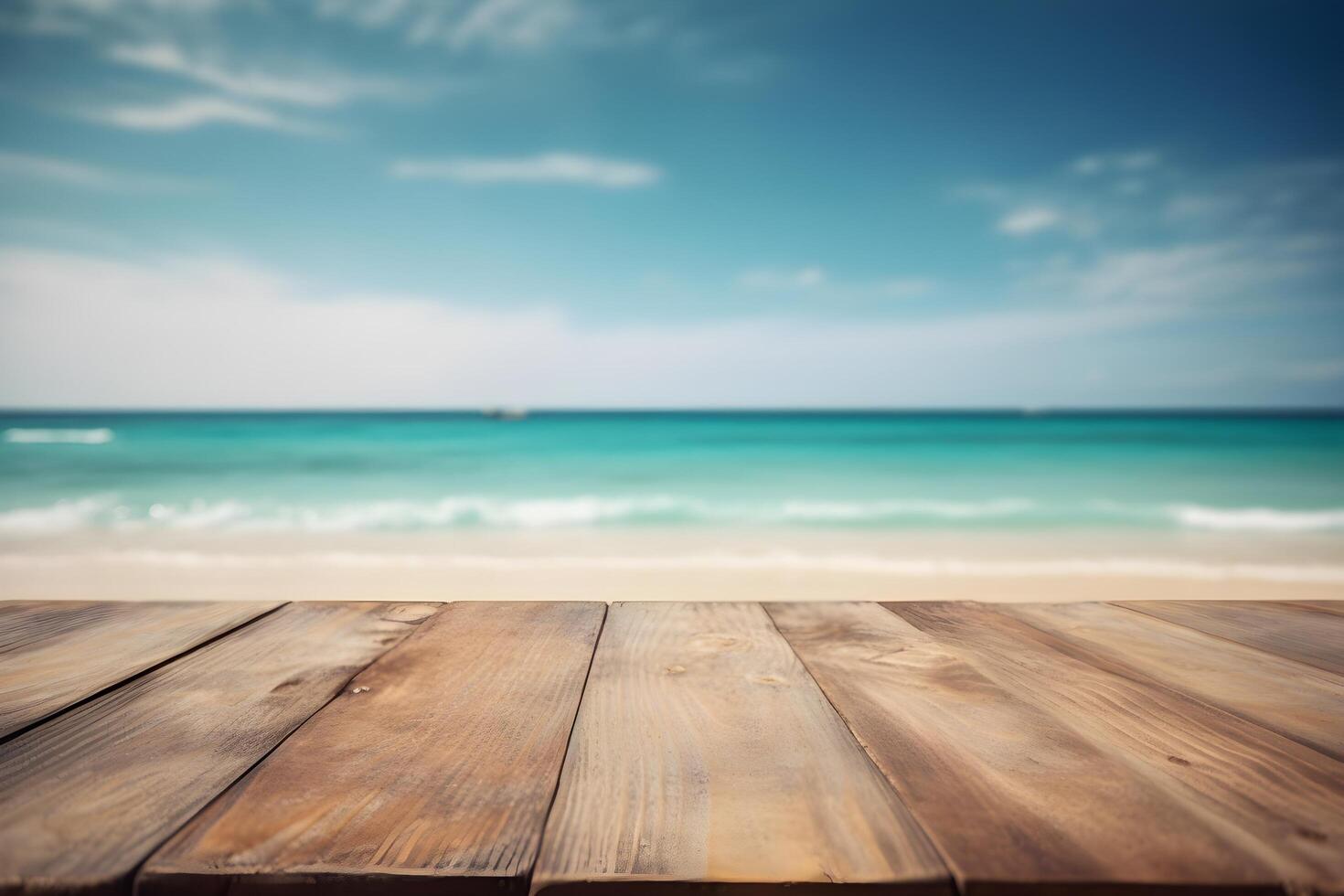 Table in front of blurred tropical beach of summer time background. photo