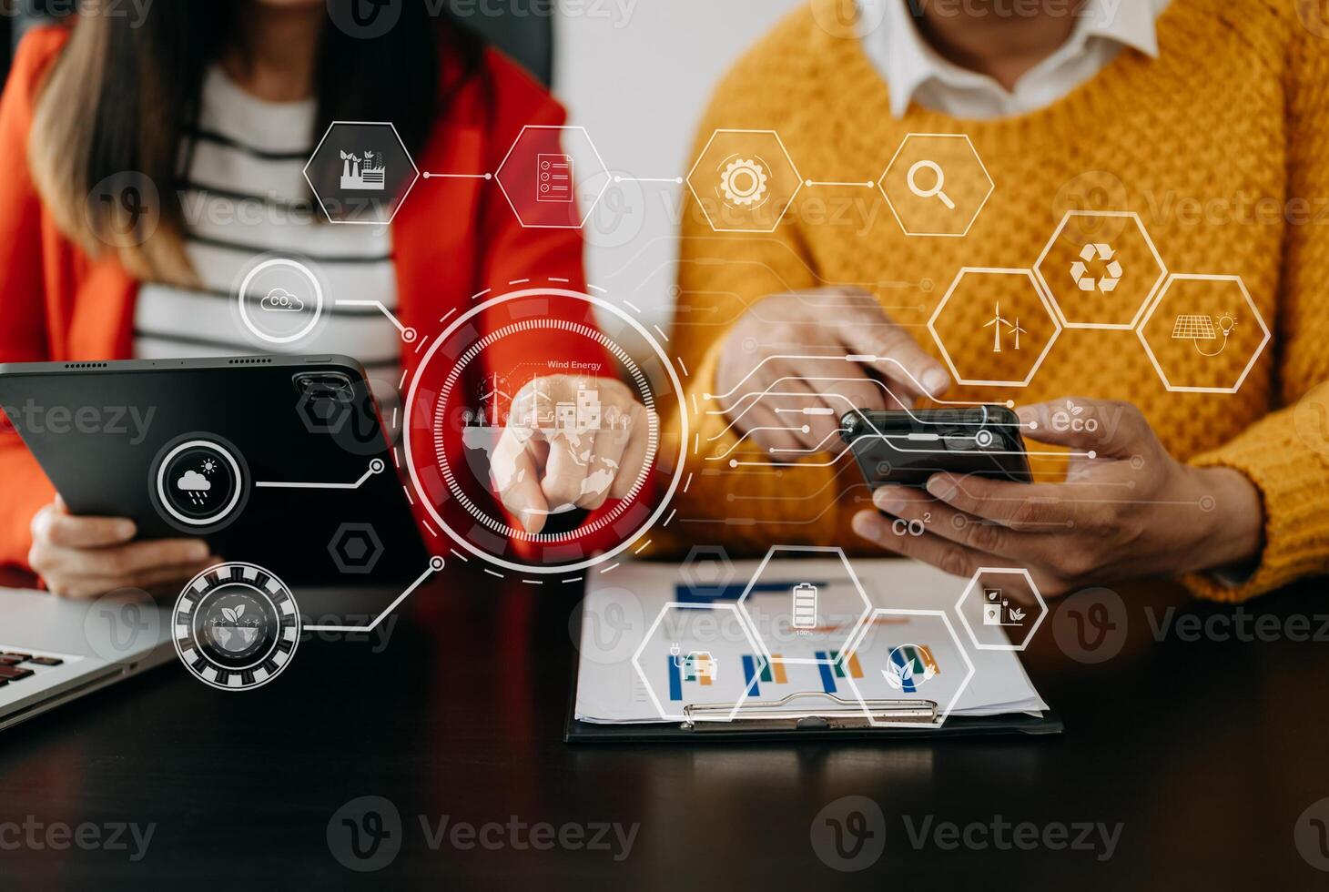 Business team working virtual modern smartphone to reduce CO2 emissions carbon footprint climate change to limit global warming.Sustainable development and green business concept. at office photo