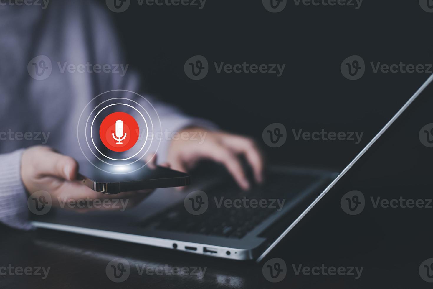 Businessman using smartphone touch microphone button on virtual screen. Blog blog speak talk advertising presentation,Voice recognition, speech detection and deep learning application,Voice Assistance photo