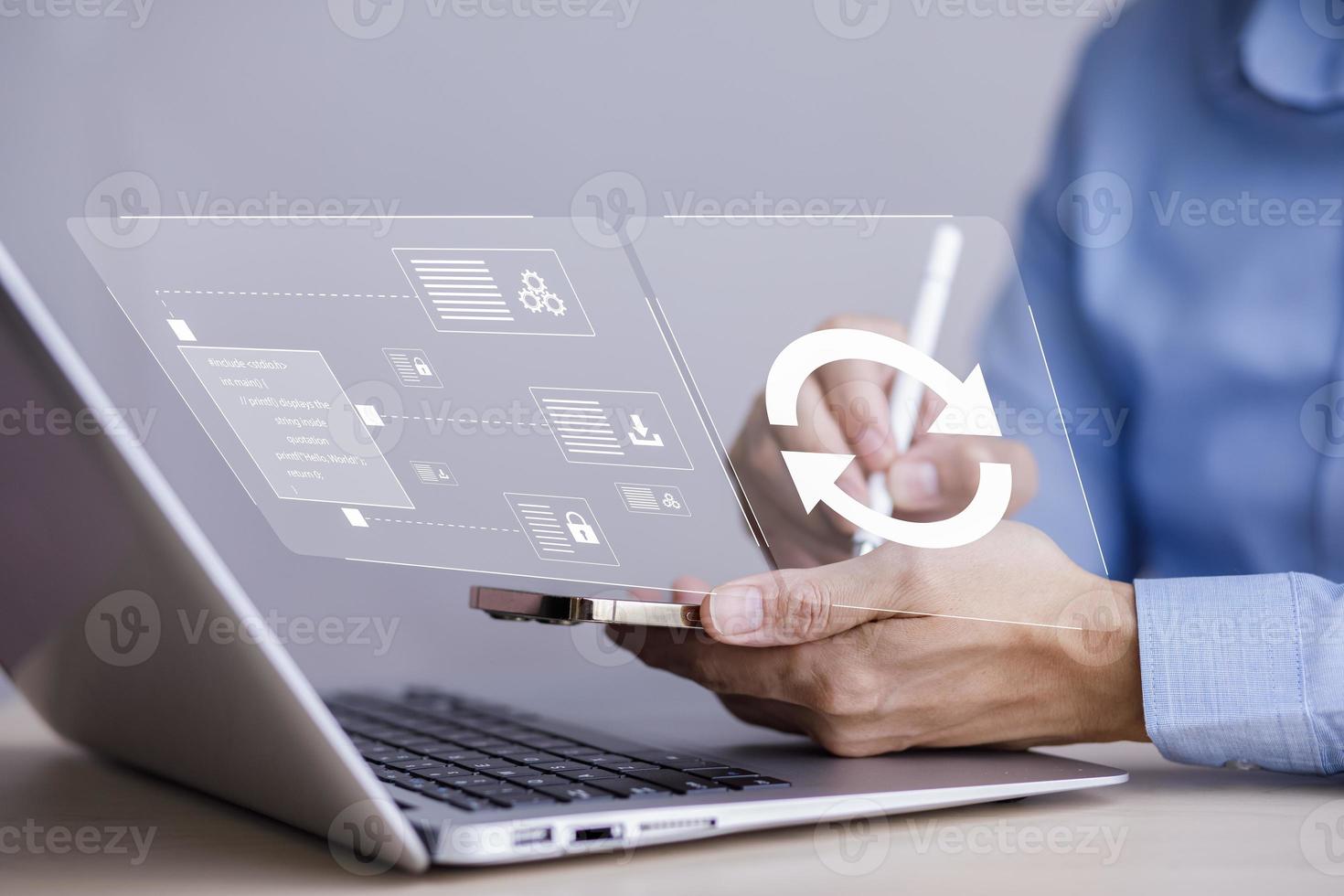 Man holds a smartphone with Update Software Computer Program Upgrade Business Technology Internet, Update on the virtual screen. Internet and technology concept, loading bar with installing the update photo