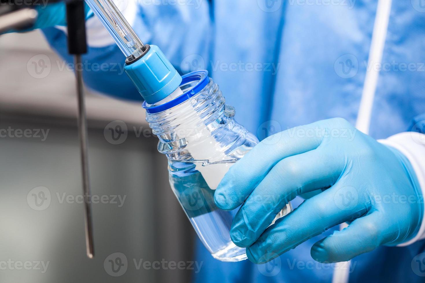 Scientist using a ph meter at laboratory photo