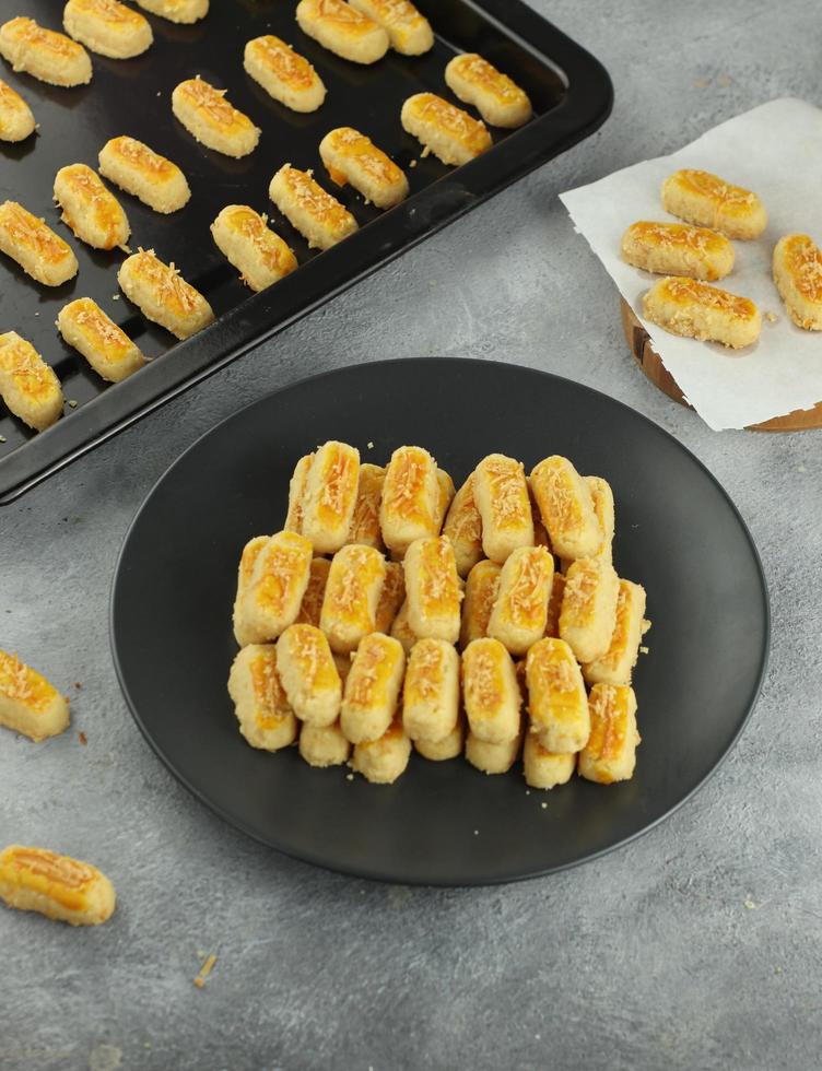 kastengel cookies Kastengel or kaasstengels is Dutch influenced Indonesian cheese cookies. It usually served in Ramadan, Eid Fitr and Eid Adha. photo