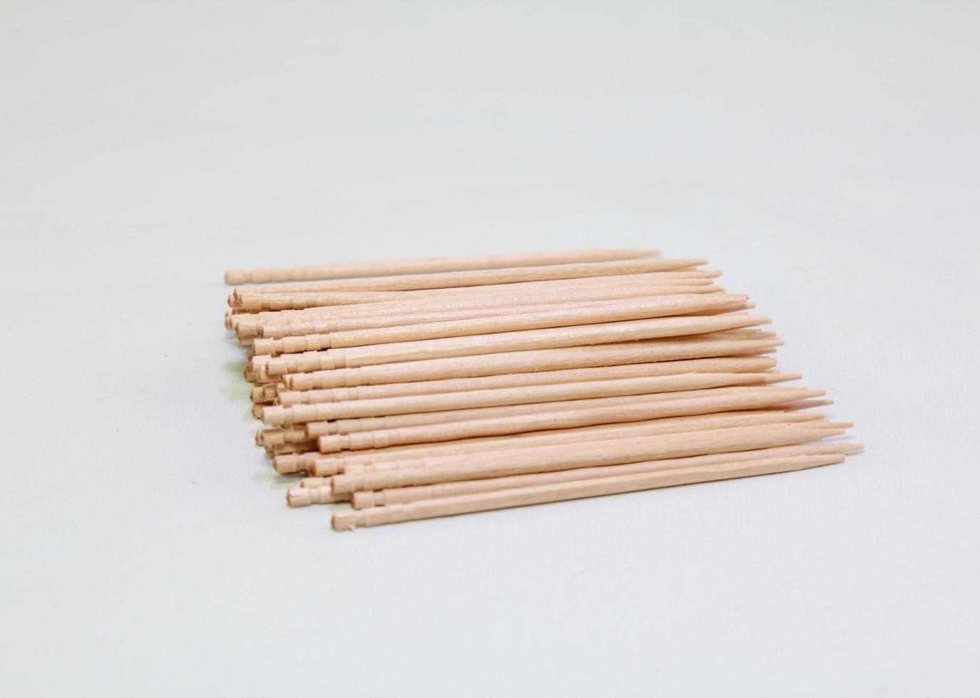 Bamboo toothpicks textures. Bamboo toothpicks isolated on white background photo