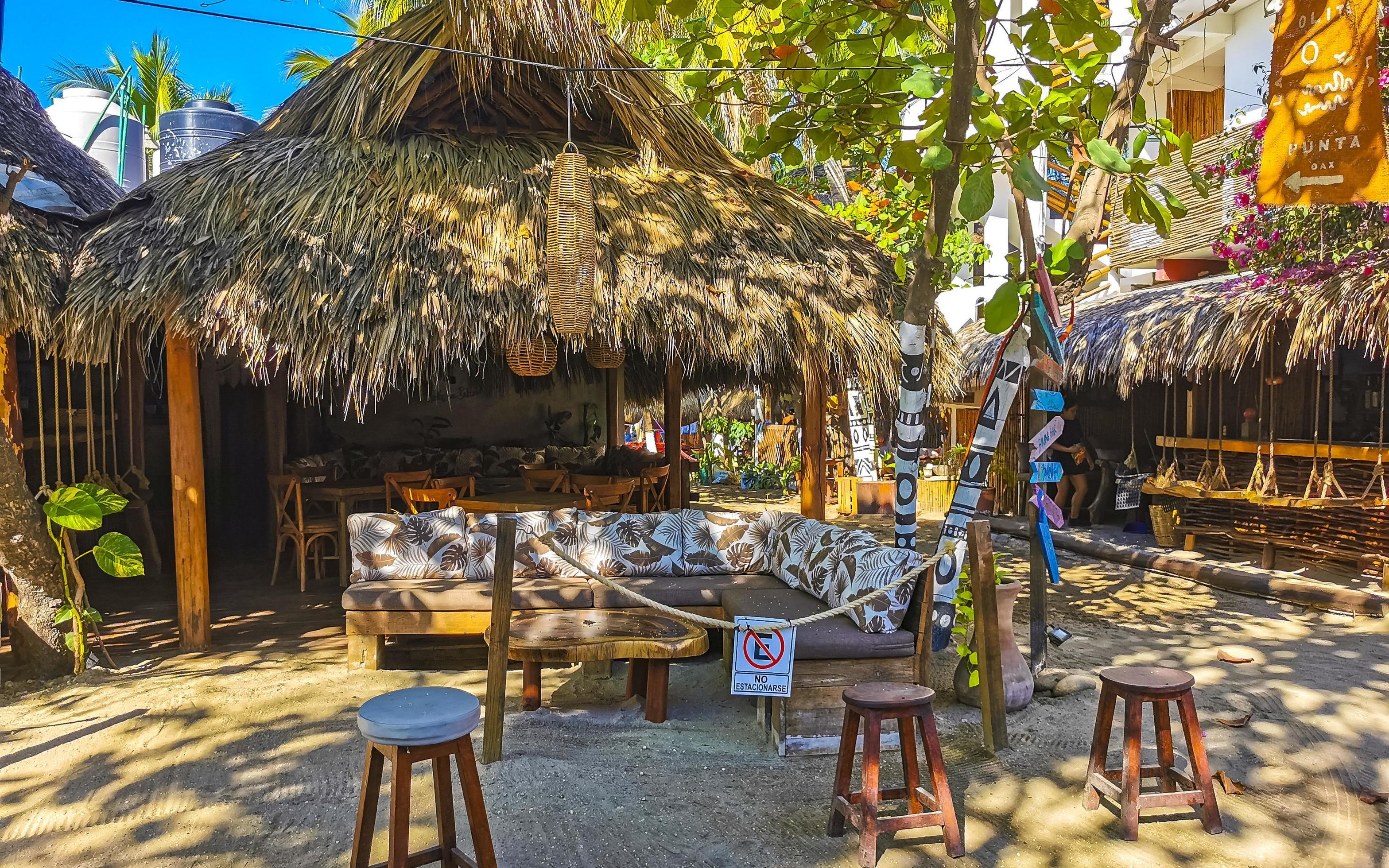 Puerto Escondido Oaxaca 2023 Colorful tourist street people stores restaurants bar La Punta