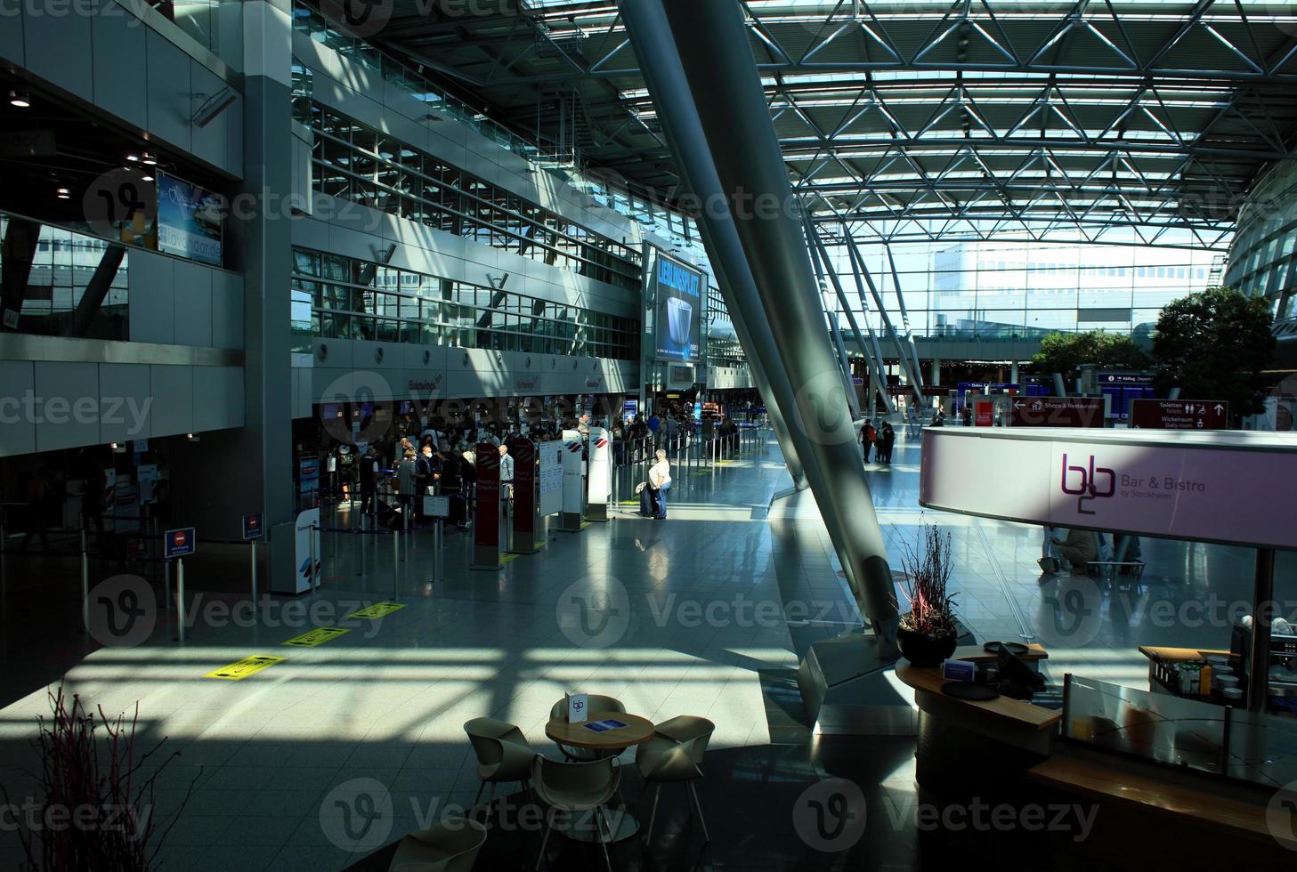 Dusseldorf, Germany, Wednesday 12 April 2023 International airport people walking and traveling in europe high quality background holidays prints photo