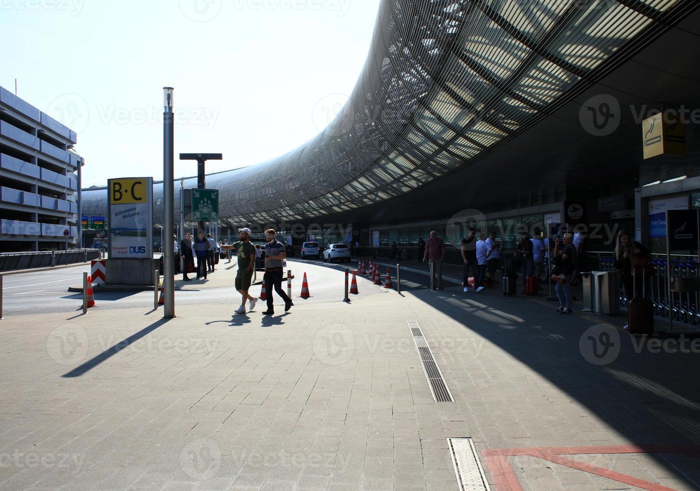 Dusseldorf, Germany, Wednesday 12 April 2023 International airport people walking and traveling in europe high quality background holidays prints photo