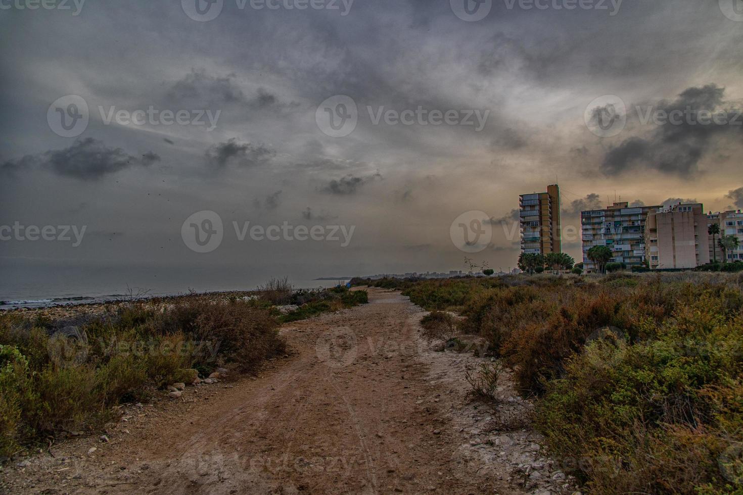 seaside landscape with sunset Alicante Spain with clouds in the sky el Campello photo