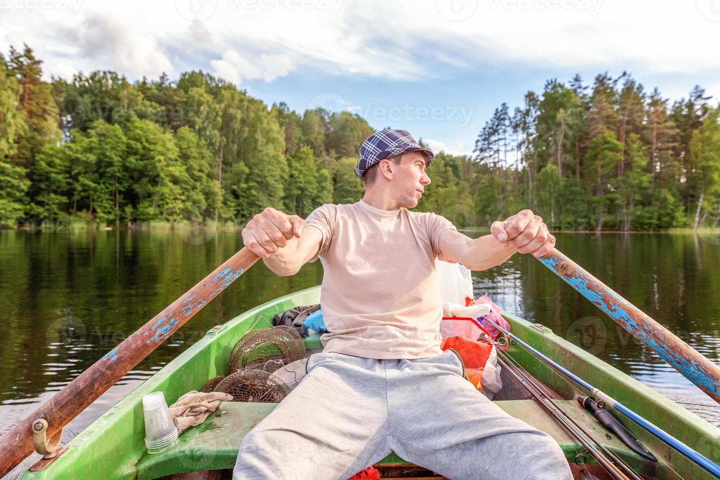 Fisherman in a boat photo