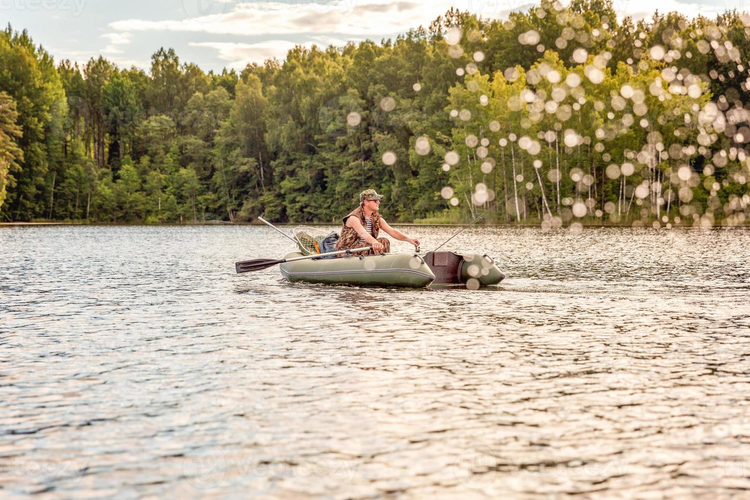 Fisherman in a boat photo