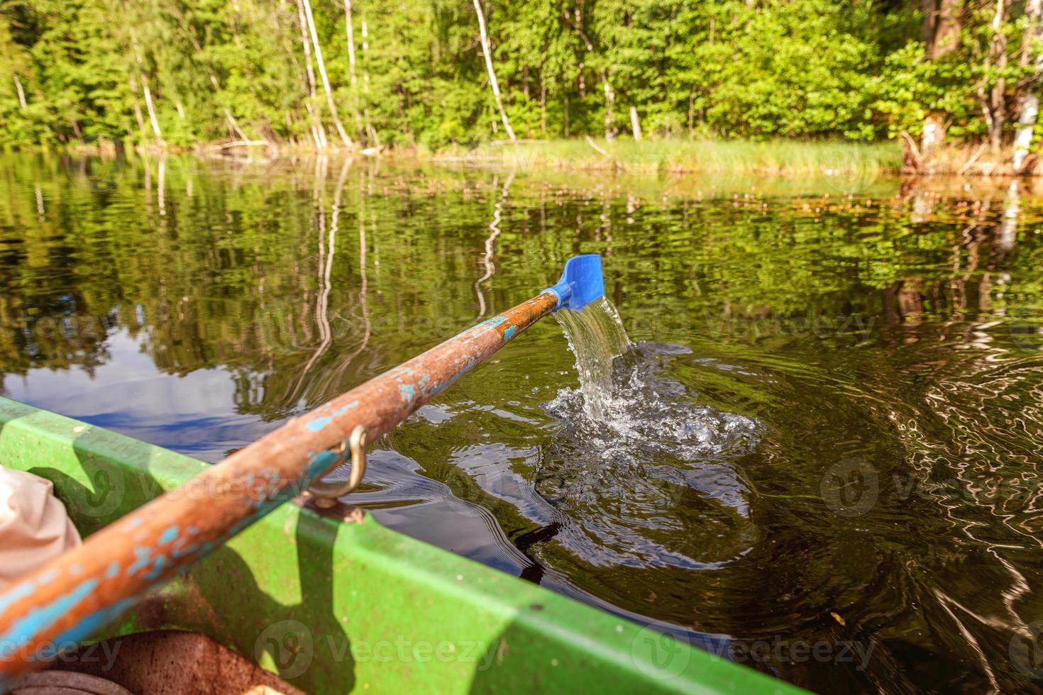 Oar paddle from row boat photo