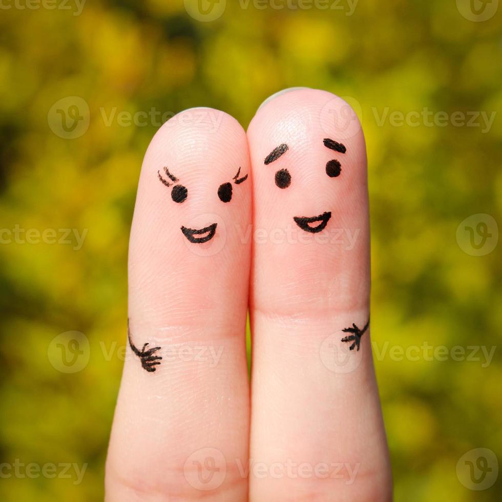 Finger art of a Happy couple. A man and a woman hug photo