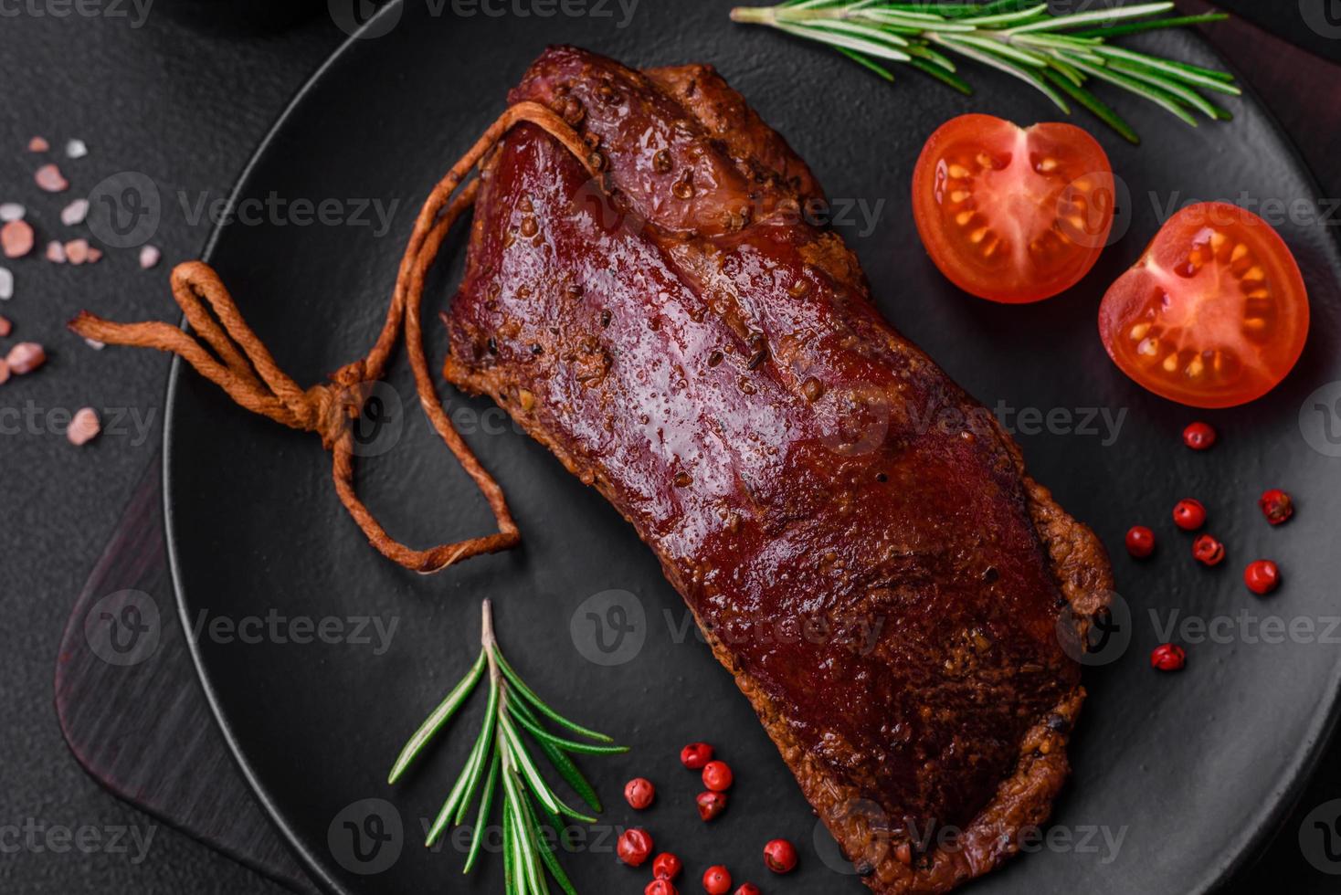 Delicious duck fillet or breast grilled or smoked with spices and salt photo