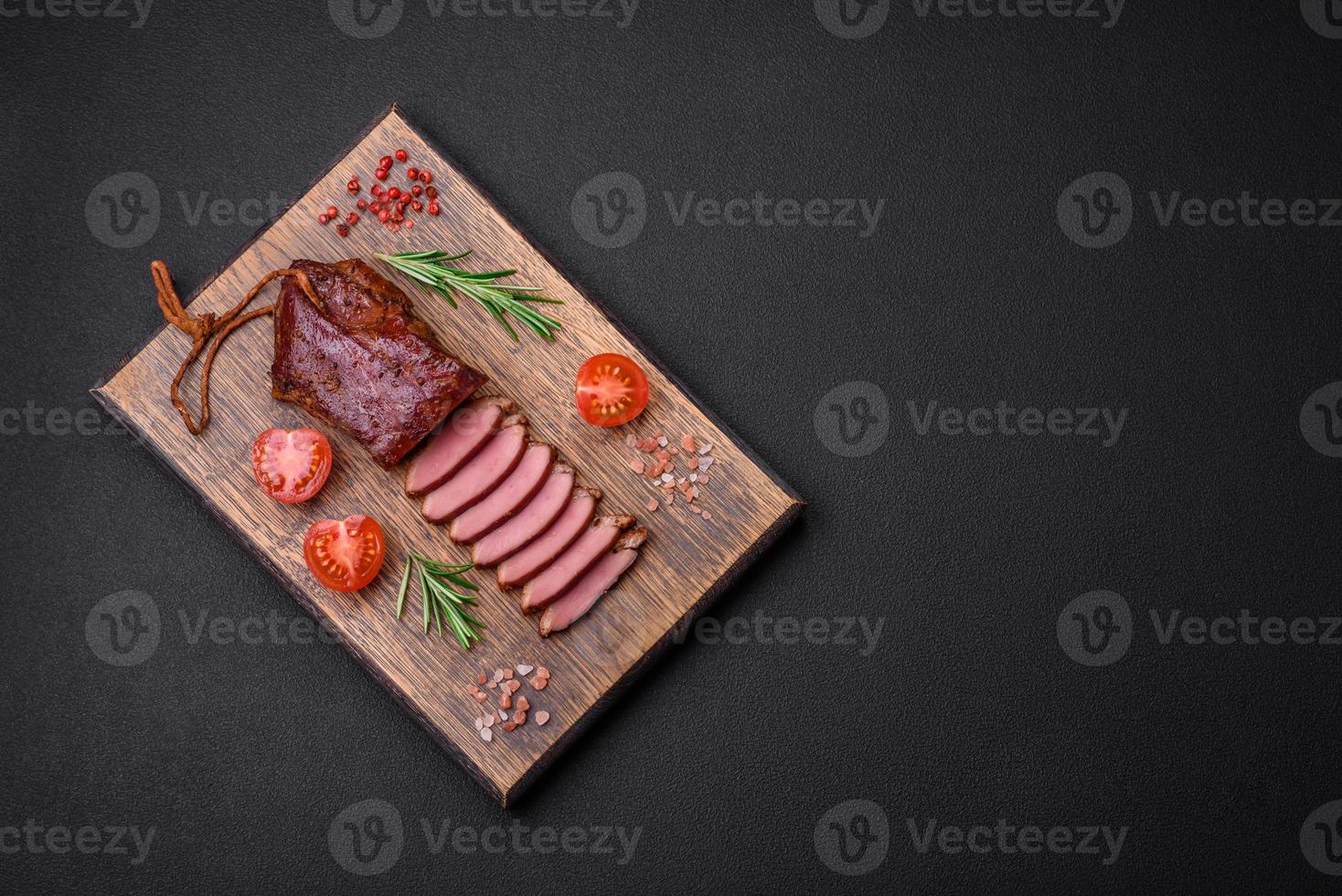 Delicious duck fillet or breast grilled or smoked with spices and salt photo