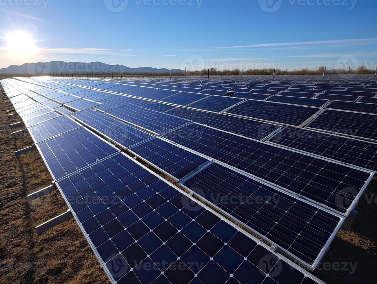Solar Panels farm or solar call farm on green hills field and blue sky background .energy and eco environment concept .focus on first solar panel. . photo