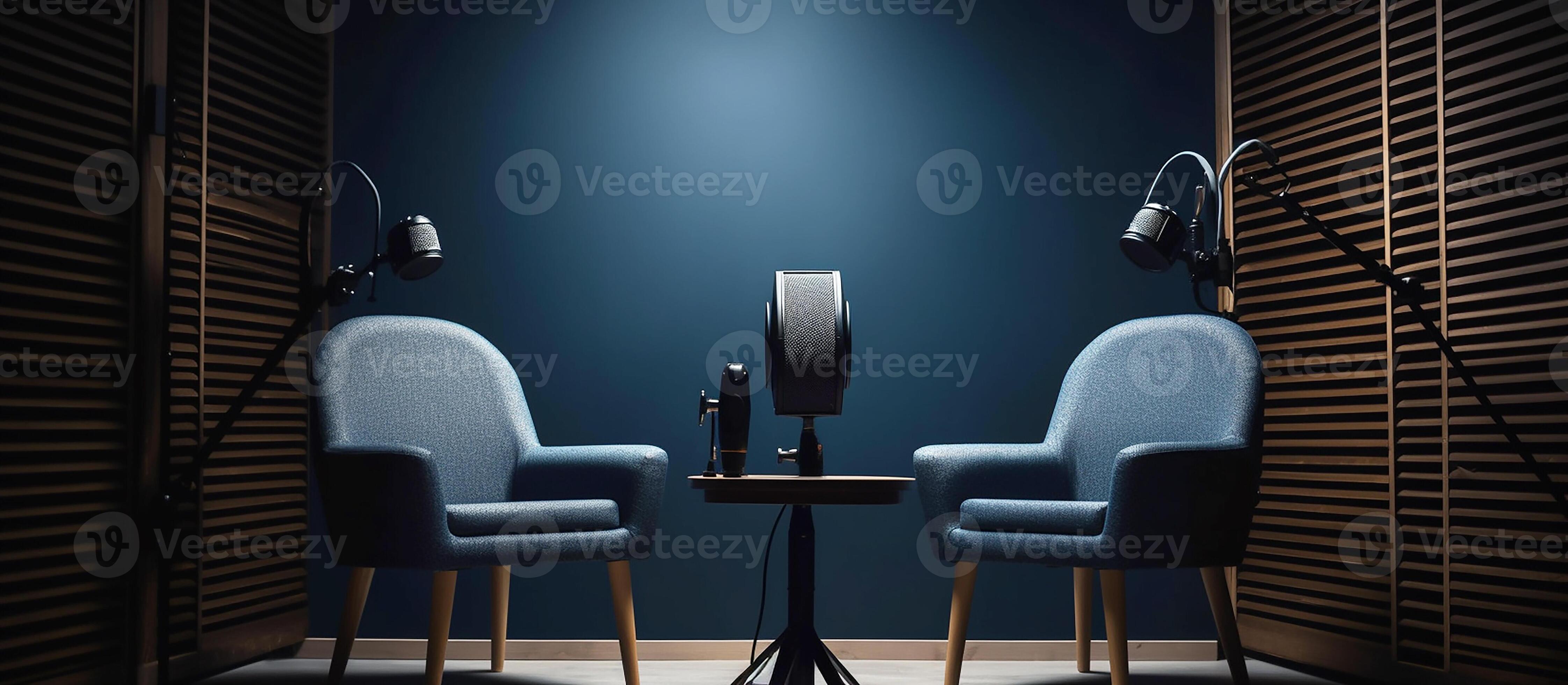 The interior of the podcast studio, two chairs with microphones, dark