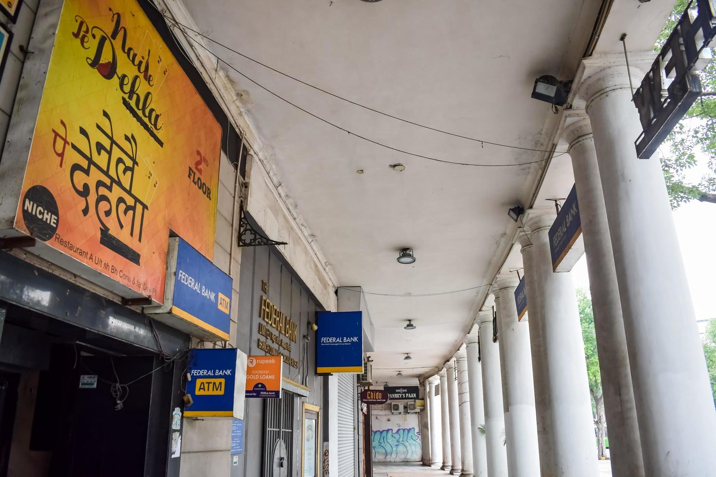Delhi, India, March 31 2023 - Famous business district Connaught Place know as CP Delhi in the centre of New Delhi India with Offices, Banks and Shopping. British style architecture CP in Delhi, India photo