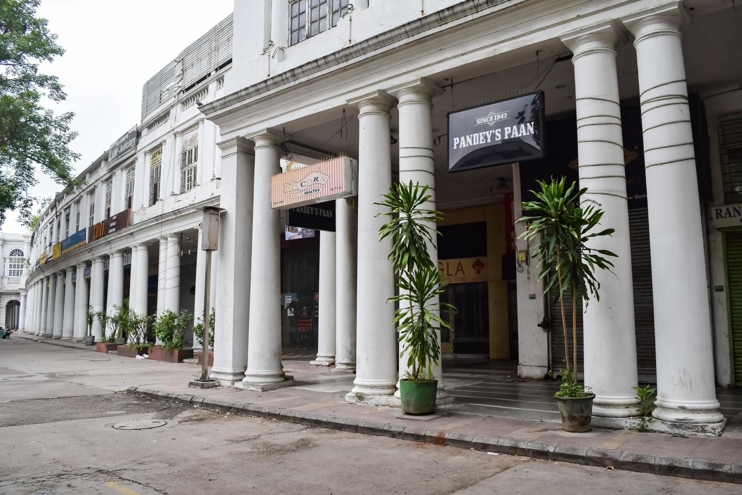 Delhi, India, March 31 2023 - Famous business district Connaught Place know as CP Delhi in the centre of New Delhi India with Offices, Banks and Shopping. British style architecture CP in Delhi, India photo