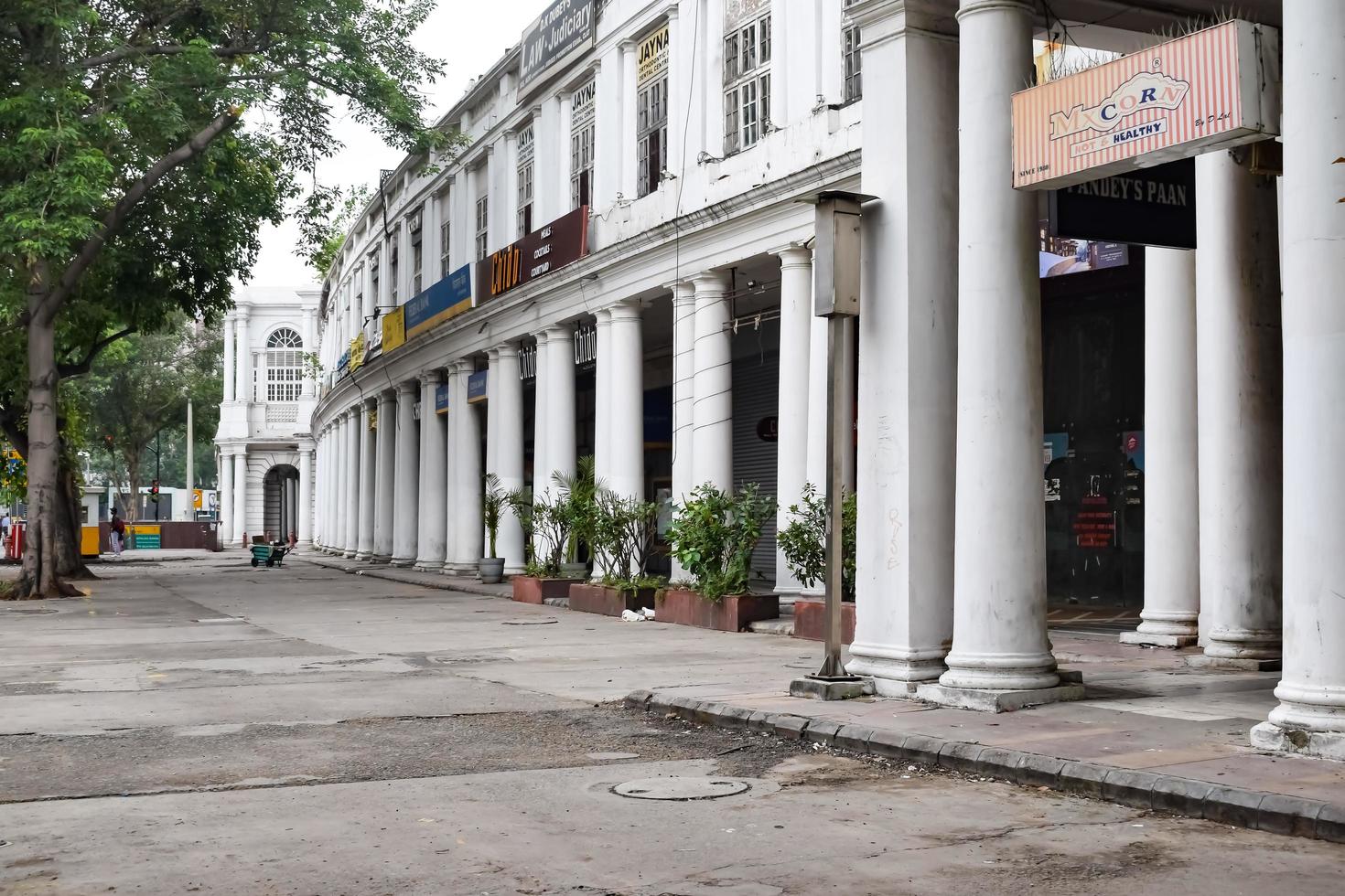 Delhi, India, March 31 2023 - Famous business district Connaught Place know as CP Delhi in the centre of New Delhi India with Offices, Banks and Shopping. British style architecture CP in Delhi, India photo