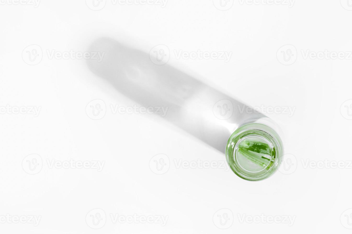 organic cosmetics, natural cosmetics, biofuels, algae. Natural green laboratory. Experiments. Glass laboratory jar with green plants on a light background. photo