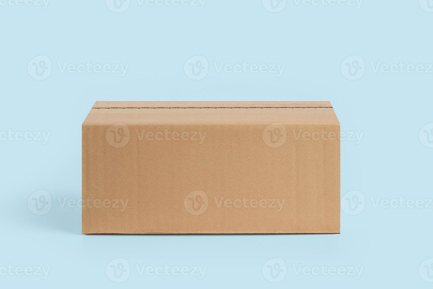 Cardboard box for delivery, parcels. On a blue, blue background photo