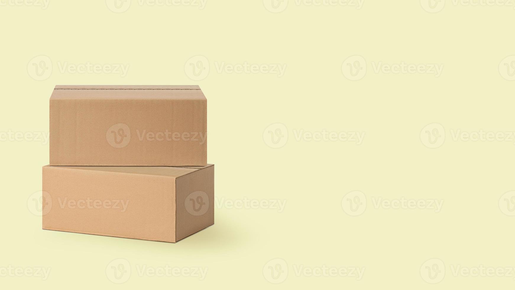 several cardboard boxes for delivery, parcels. On a yellow background. photo