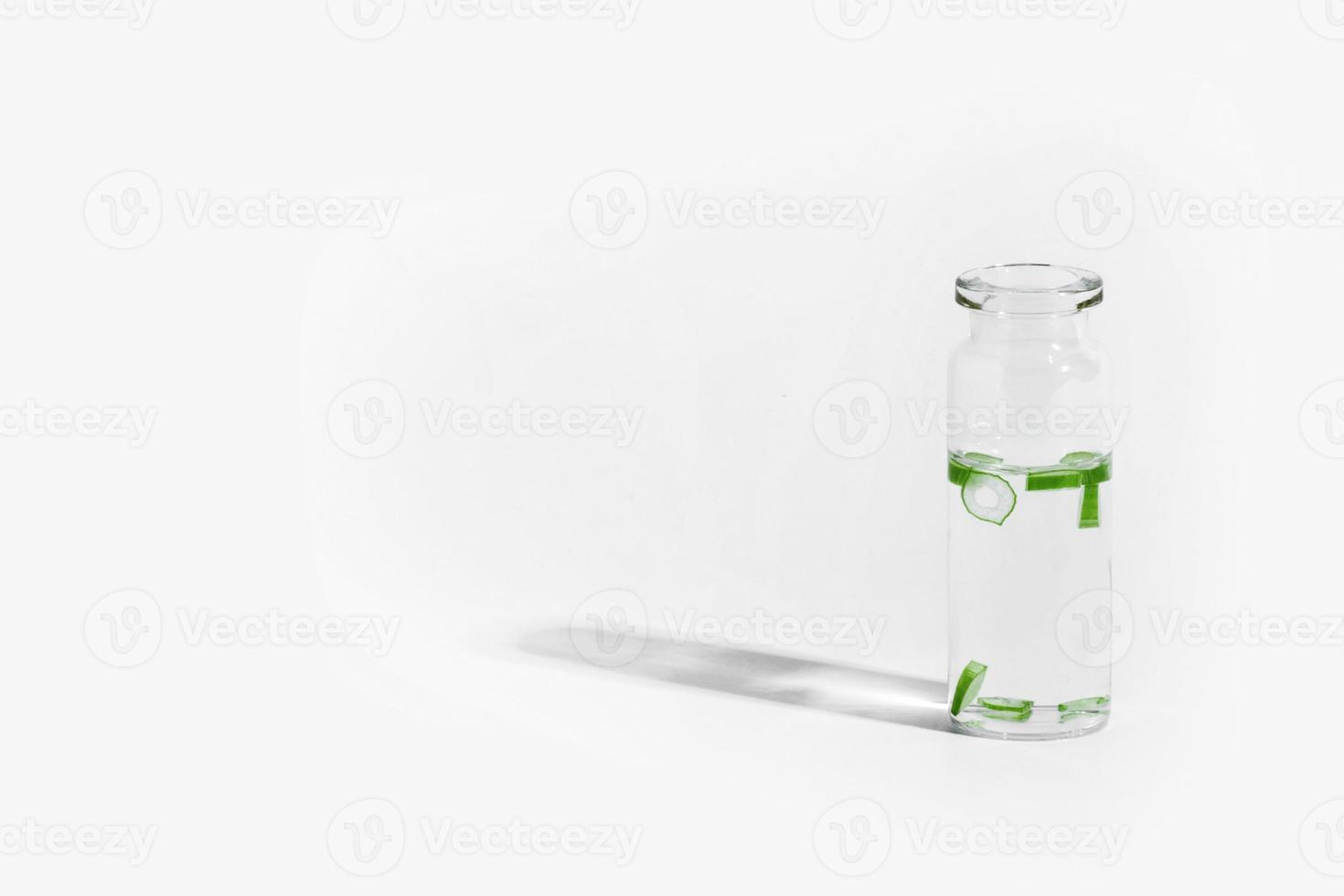 organic cosmetics, natural cosmetics, biofuels, algae. Natural green laboratory. Experiments. Glass laboratory jar with green plants on a light background. photo