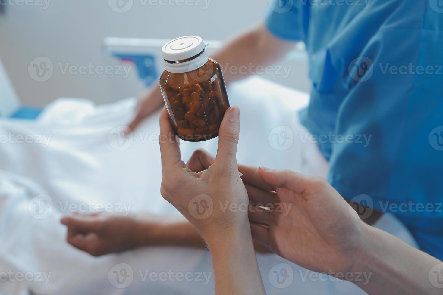 Women Asian doctors hold the patient hand and encourage and provide medical advice While checking the patient health in bed. Concept of Care and compassion, antenatal care, Threatened abortion photo