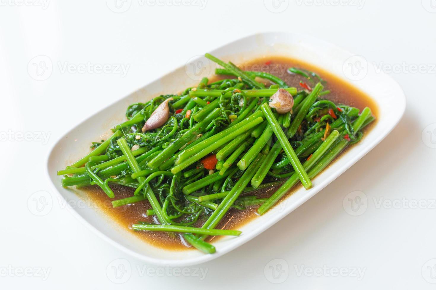 Stir fried vegetable fern with oyster sauce photo