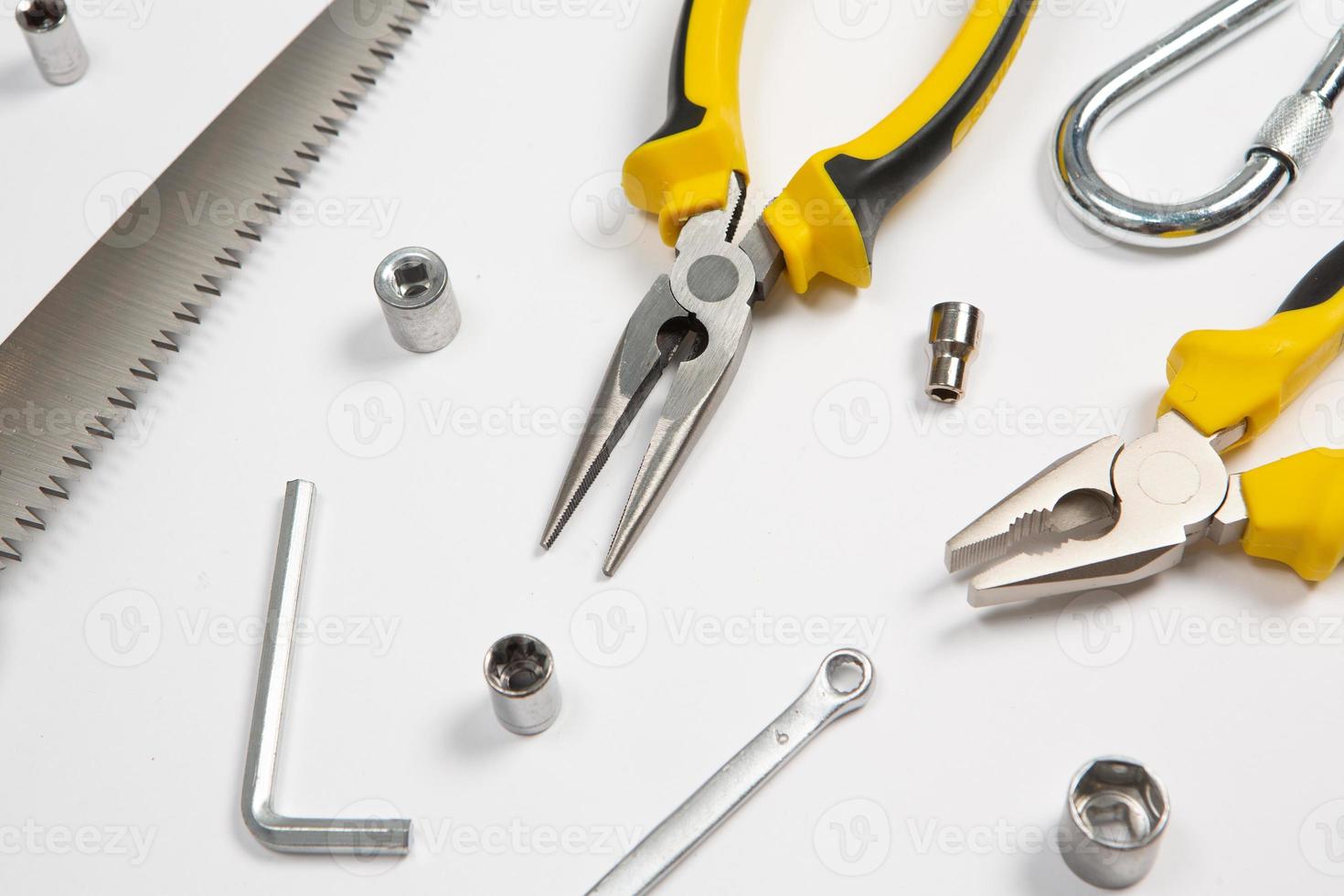 Set of tools for repair in a case on a white background. Assorted work or construction tools. Wrenches, Pliers, screwdriver. Top view photo