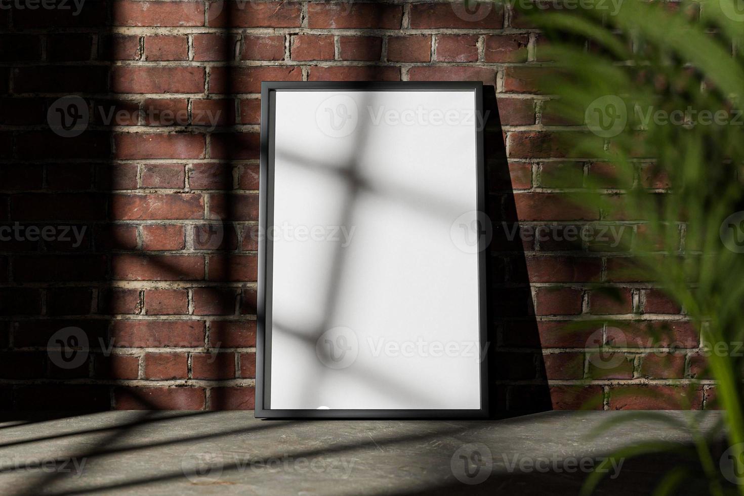 Black Frame Mockup on brick wall with window shadow in loft interior photo