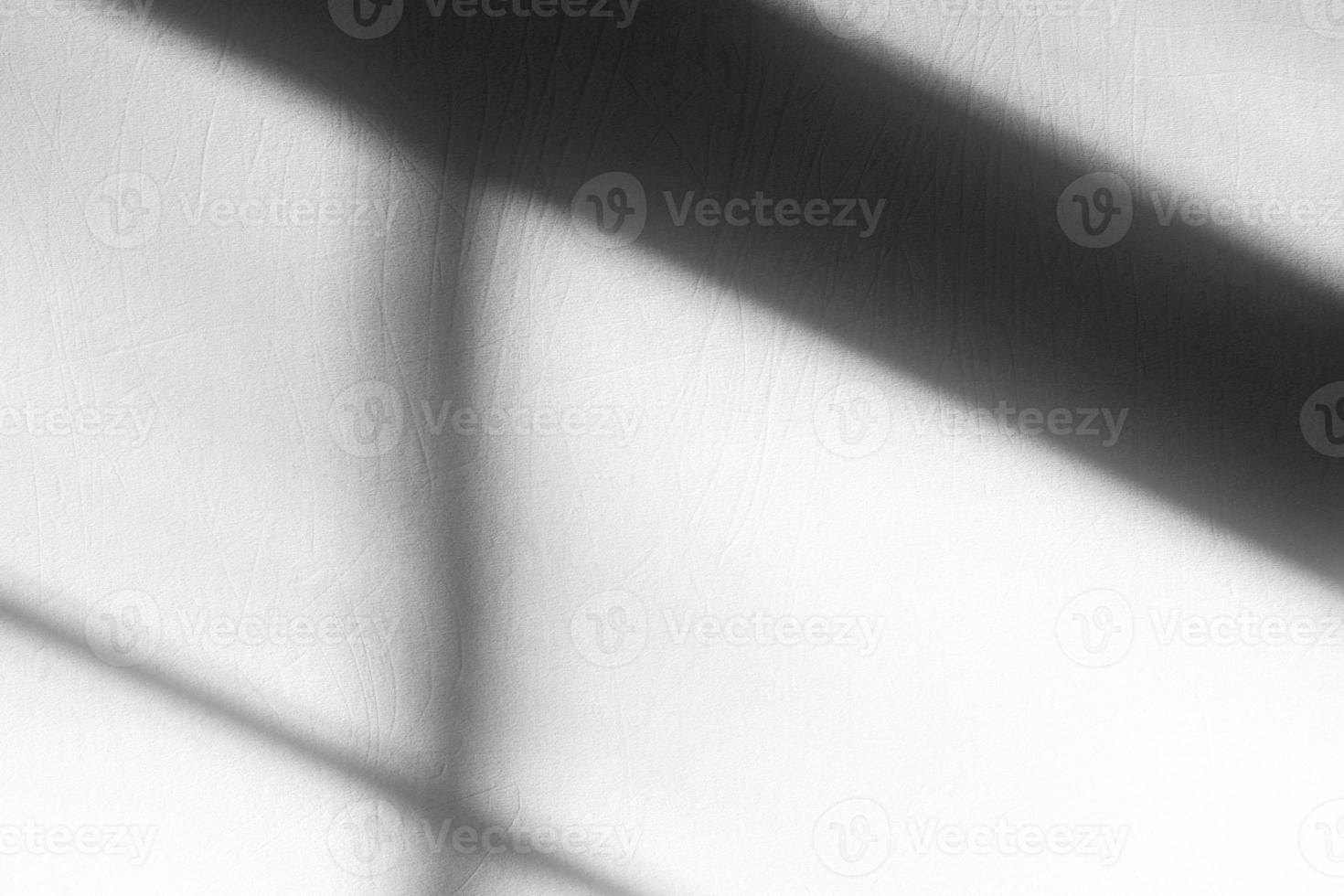 Shadow of Window on White Concrete Wall Texture Background, Suitable for Color Cast. photo