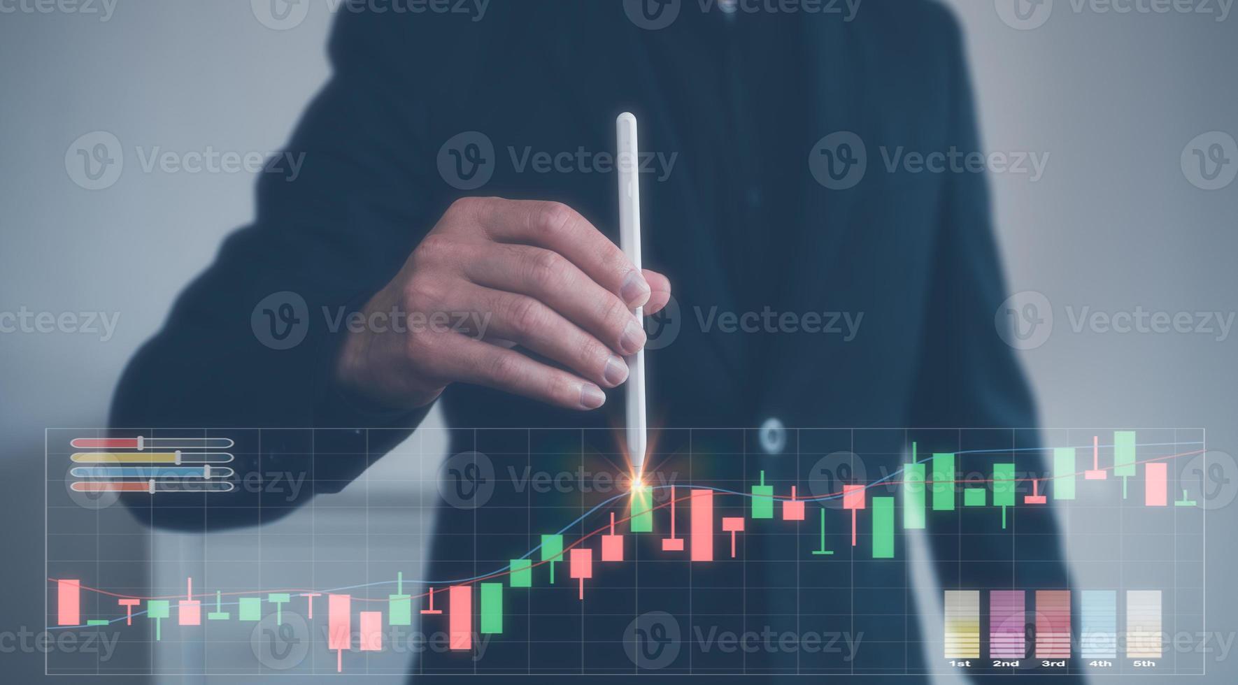 Businessman or trader is pointing a growing virtual hologram stock, invest in trading, planning analyze indicator and strategy buy and sell, Stock market, Business growth concept. photo
