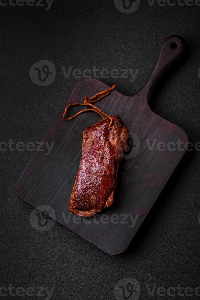 Delicious duck fillet or breast grilled or smoked with spices and salt photo