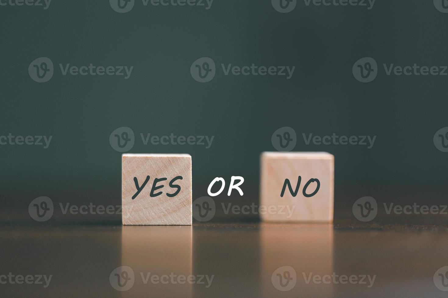 concept of choice yes or no on wooden cubic blocks. Business and lifestyle concept. Think With Yes Or No Choice, Business Choices For Difficult Situations, two wooden with yes or no word on it. photo