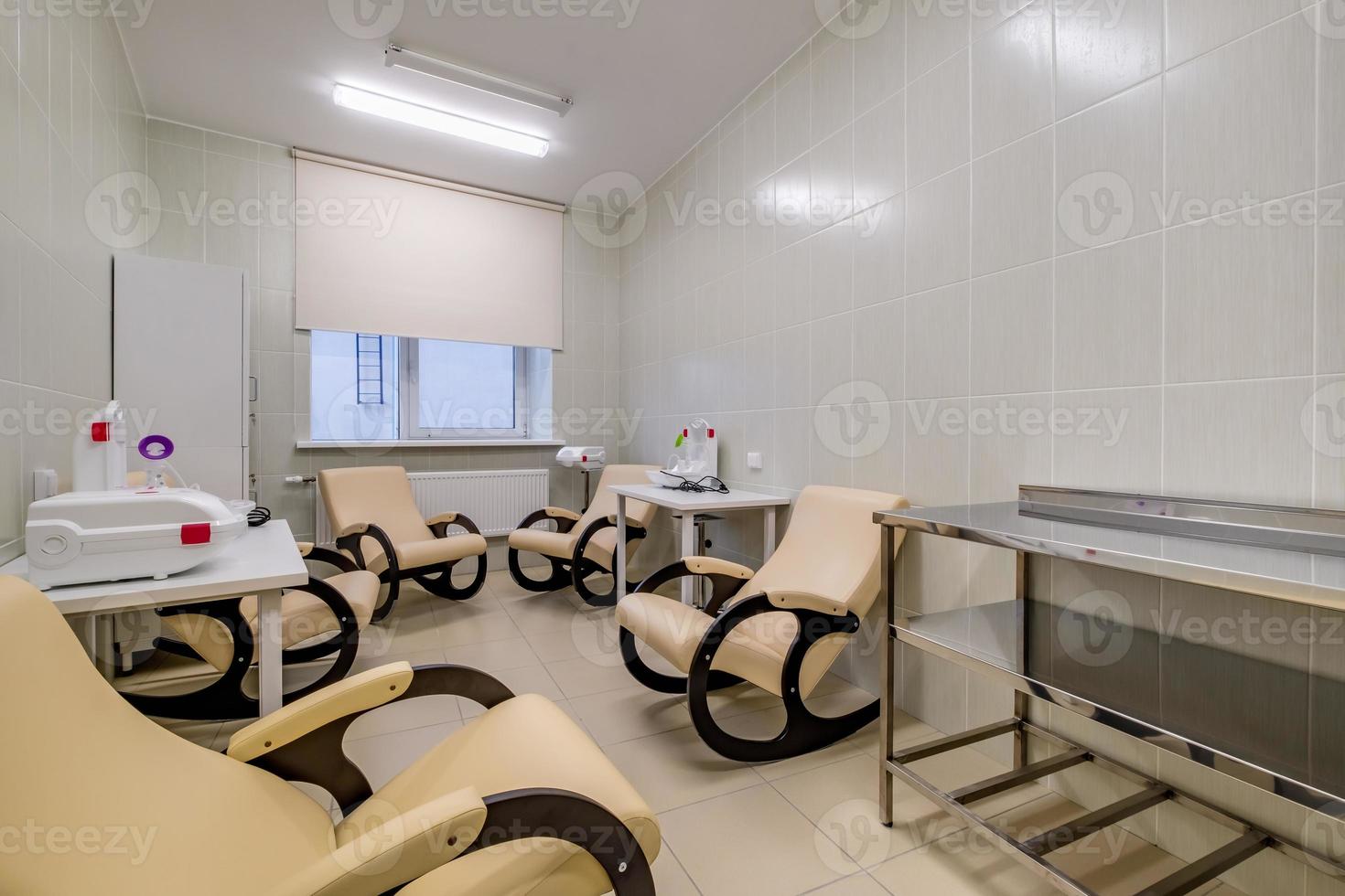 relaxation room with chairs and exercise equipment in office for rest and relax of staff photo