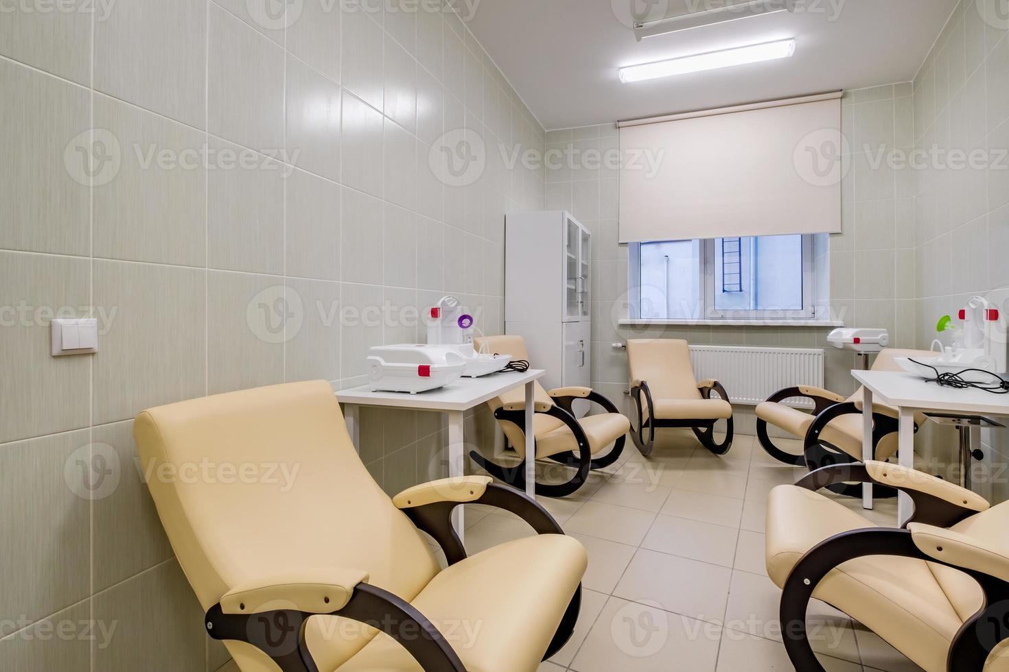 relaxation room with chairs and exercise equipment in office for rest and relax of staff photo