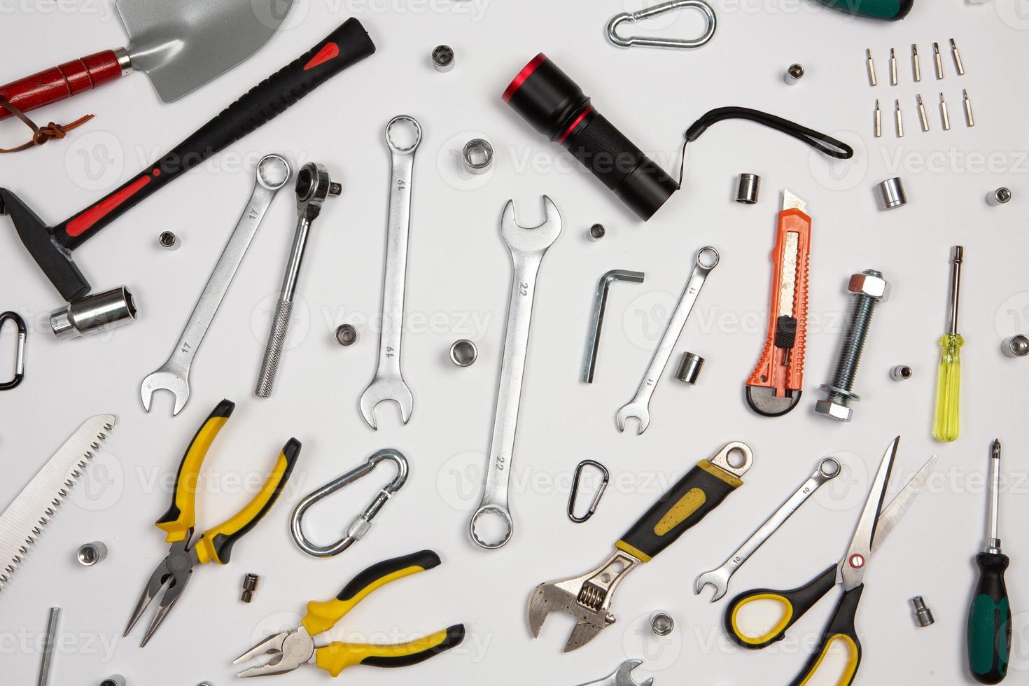 Set of tools for repair in a case on a white background. Assorted work or construction tools. Wrenches, Pliers, screwdriver. Top view photo