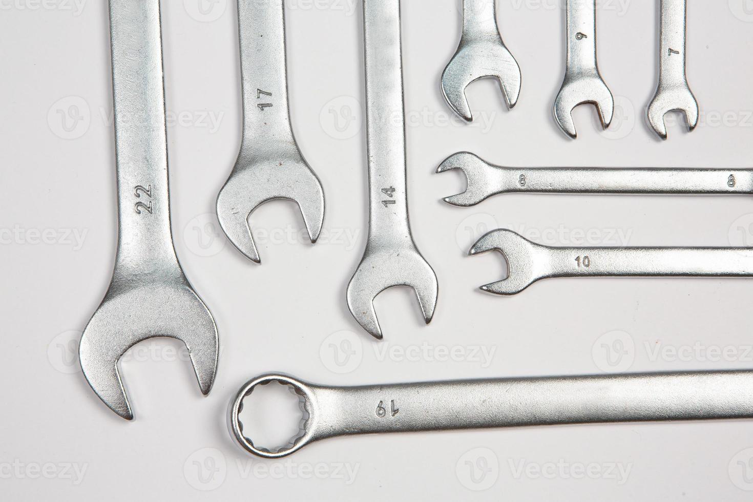 Set of tools for repair in a case on a white background. Assorted work or construction tools. Wrenches, Pliers, screwdriver. Top view photo