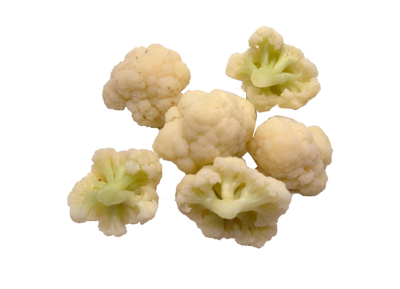 cauliflower pieces isolated in white background photo