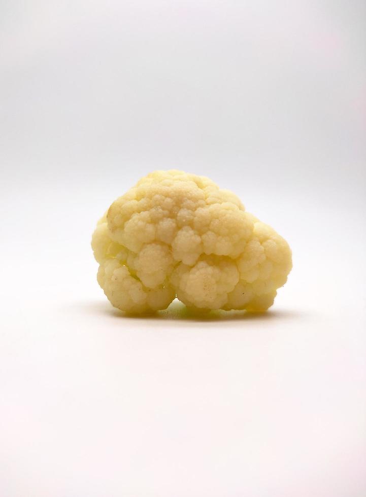 cauliflower pieces isolated in white background photo