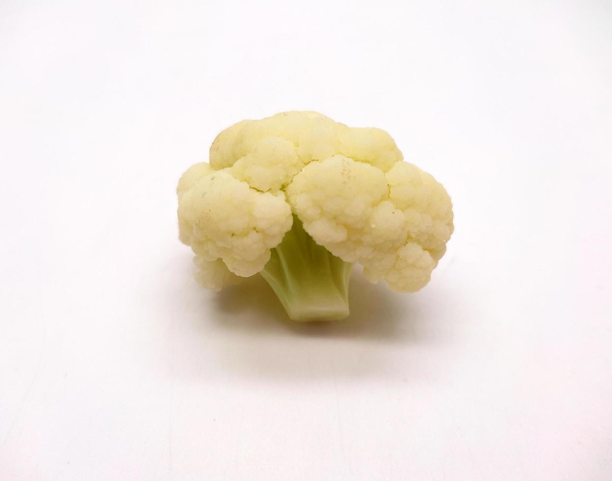 cauliflower pieces isolated in white background photo