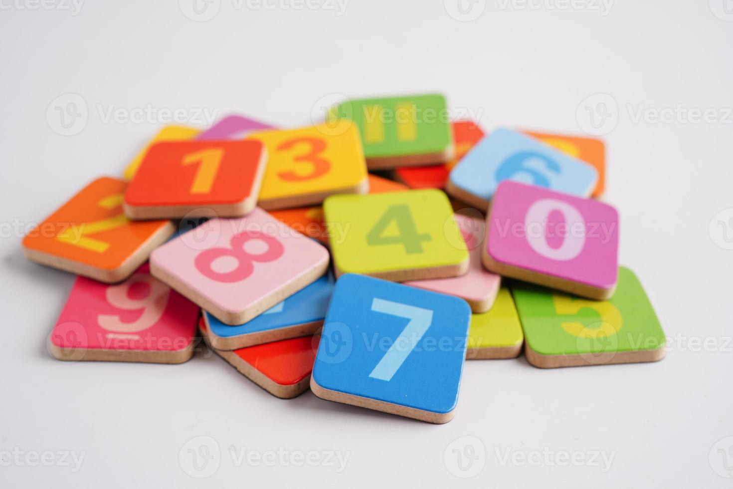 Number wood block cubes for learning Mathematic, education math concept. photo