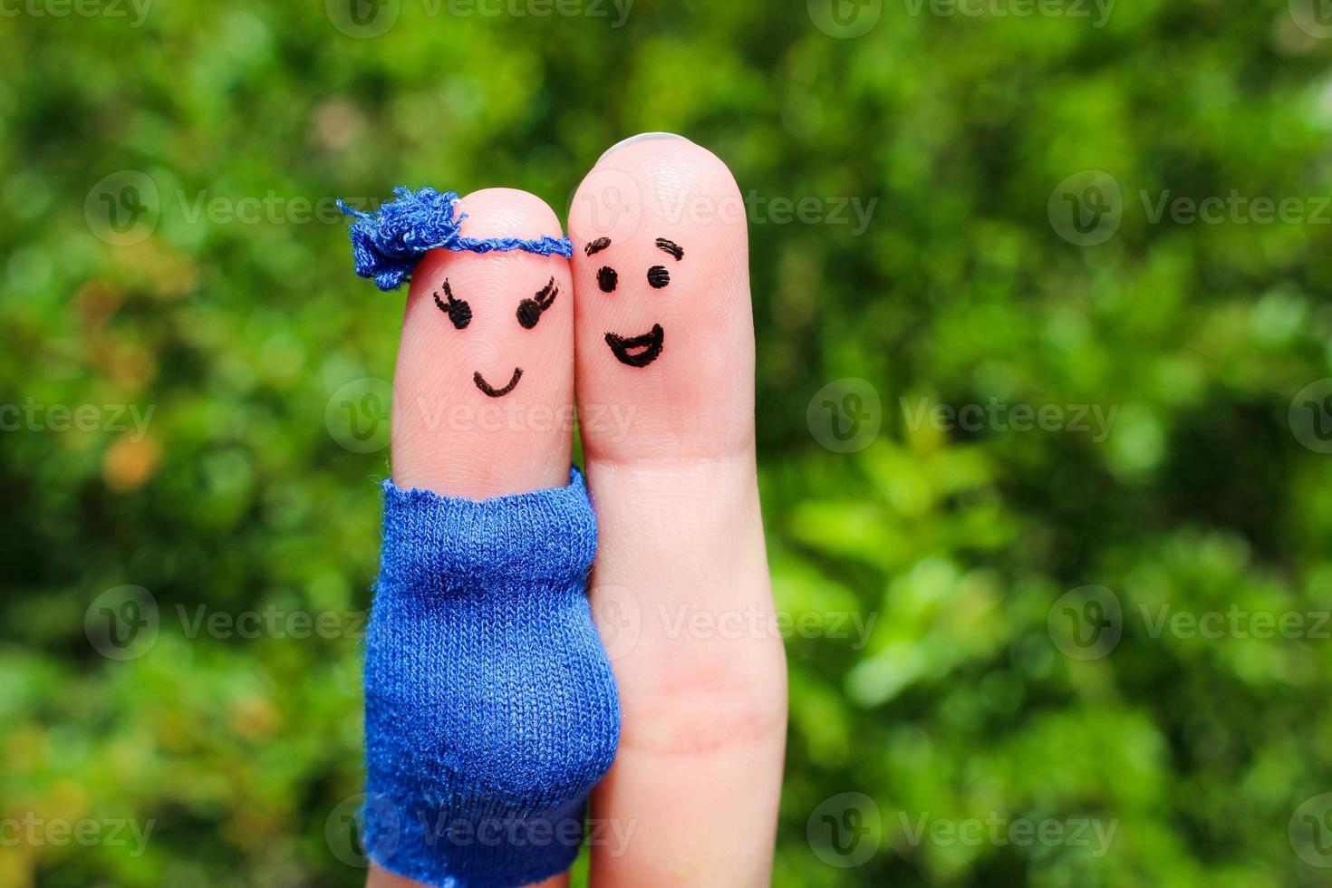 Finger art of a Happy couple. woman is pregnant. photo