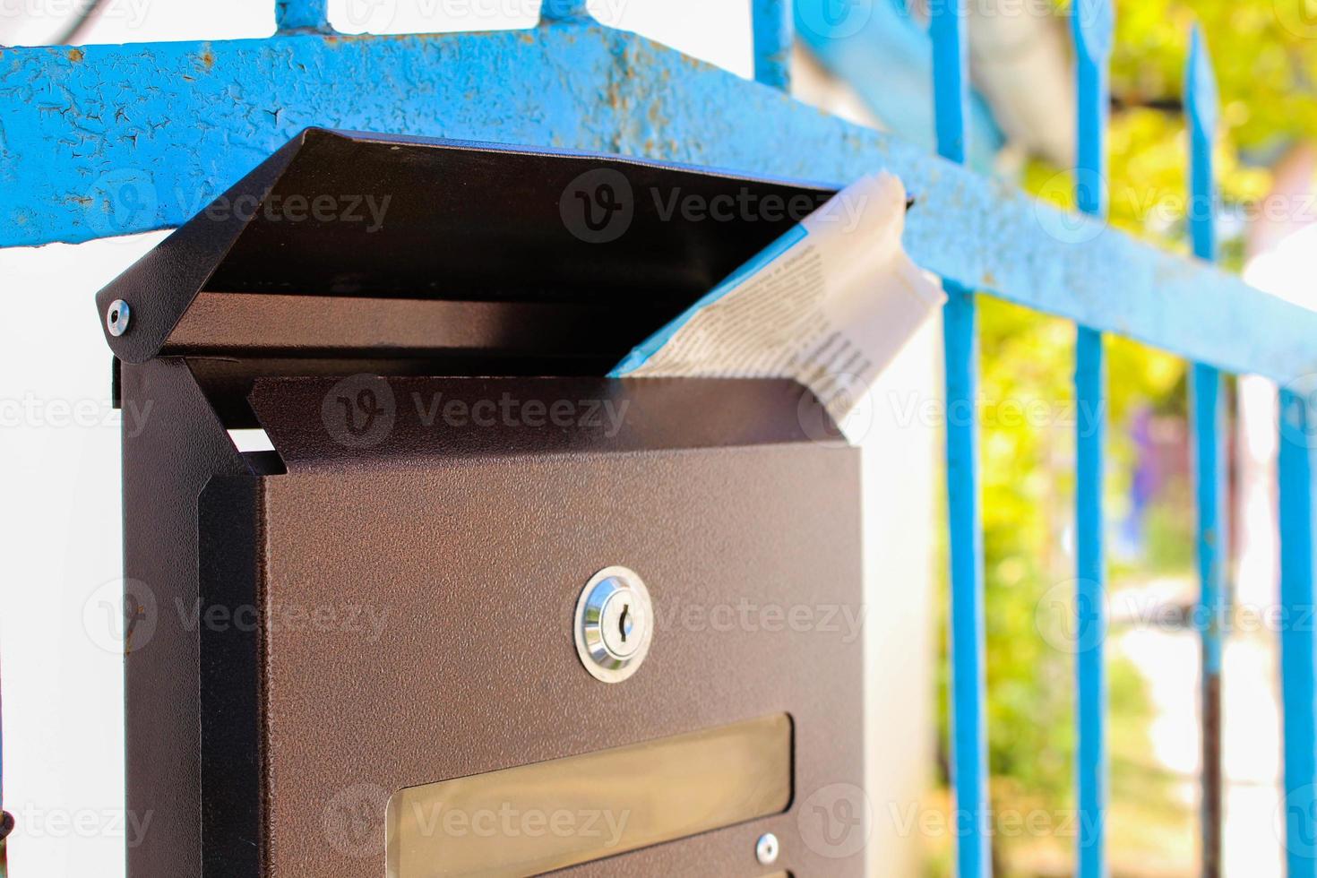 Mailbox with newspaper photo