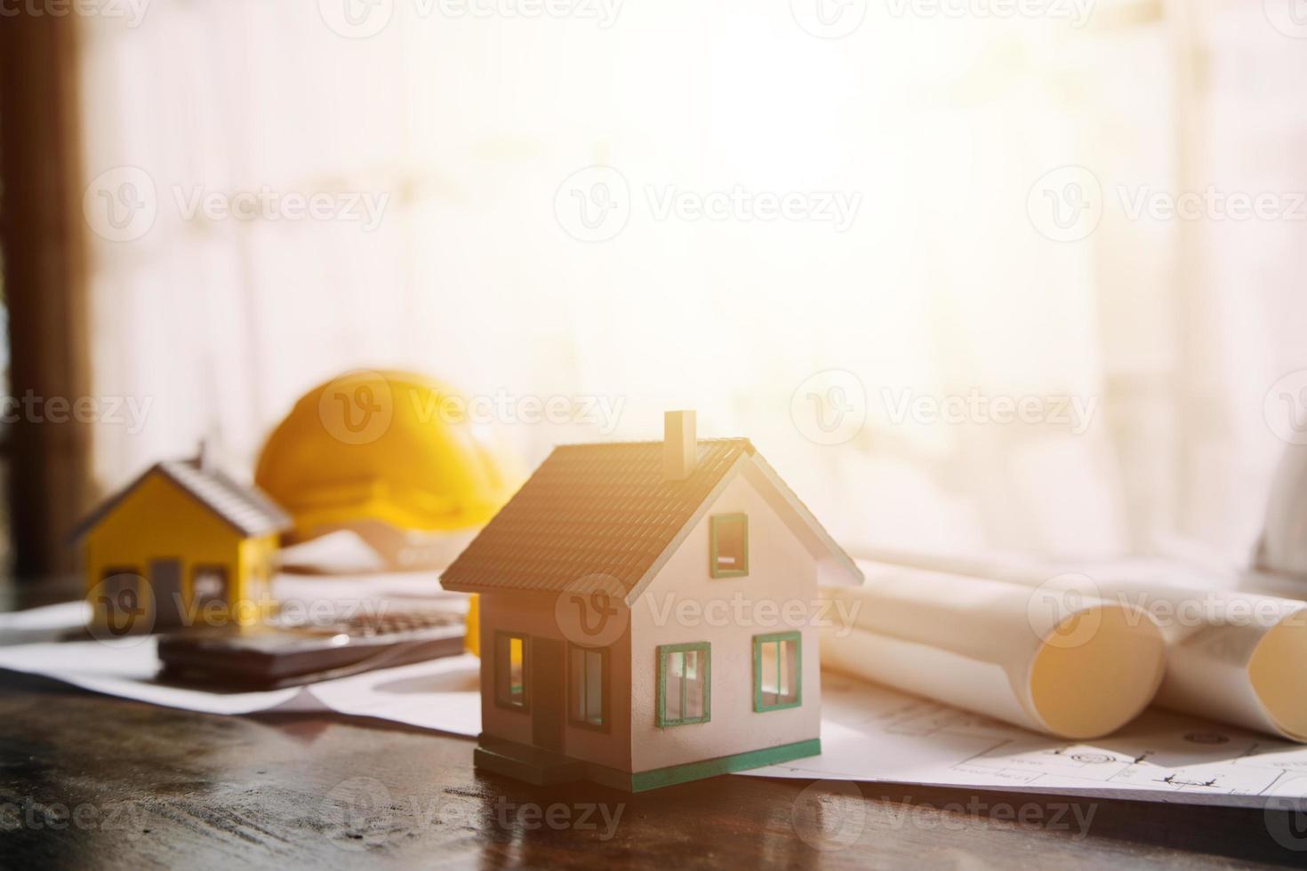 Architect concept, Architects working with blueprints in the office, Vintage Effect photo