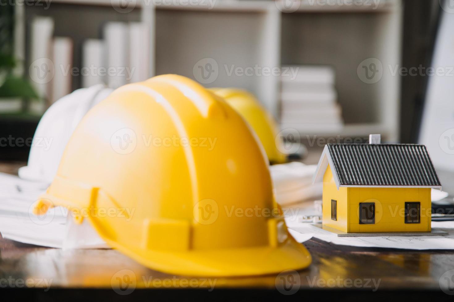 Architect concept, Architects working with blueprints in the office, Vintage Effect photo