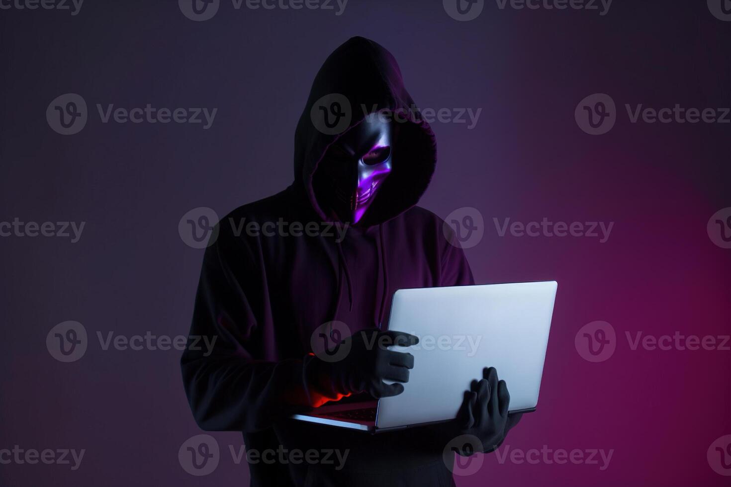 un hacker en un capucha utilizando un ordenador portátil computadora aislado en oscuro antecedentes con neón ligero. ai generado foto