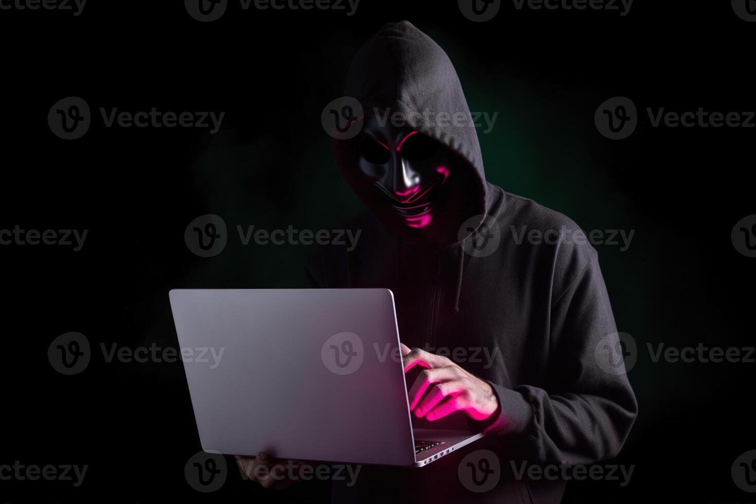 un hacker en un capucha utilizando un ordenador portátil computadora aislado en oscuro antecedentes con neón ligero. ai generado foto